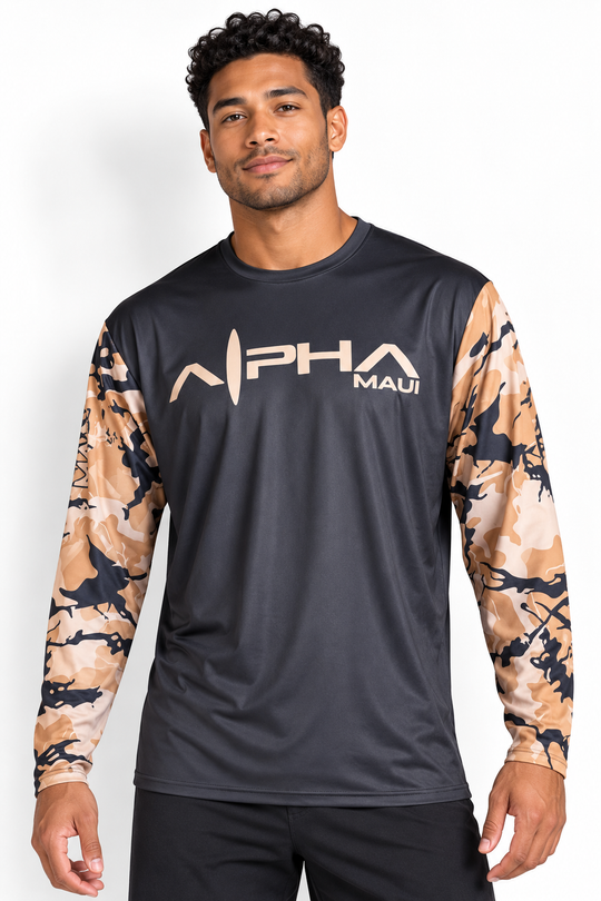 Model wearing Alpha Maui Alpha Force long-sleeve performance shirt with sand logo and camouflage sleeves
