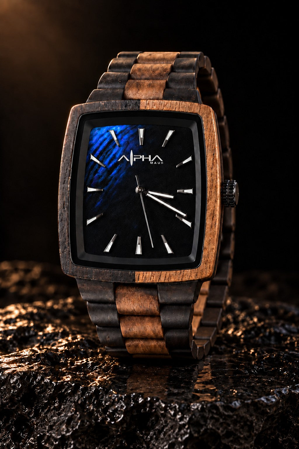 Axis Abyss watch photographed on a dark lava slab