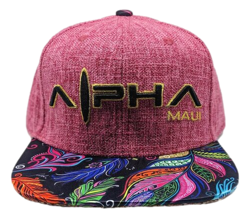 The "Feathers" cap is a vibrant red hat emblazoned with "Alpha Maui" in elegant gold letters on the front. Its visor showcases a beach-inspired, intricate leafy pattern brimming with vivid shades of blue, green, orange, red, and purple. Perfect for your next Hawaiian adventure!