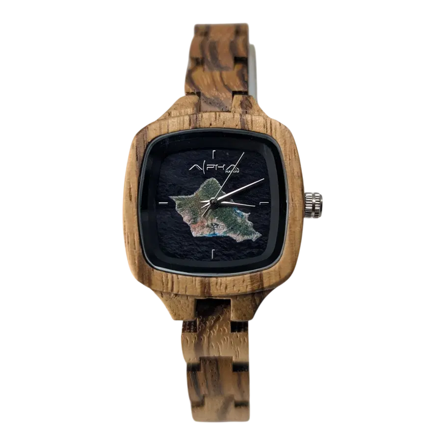 The Alpha Maui The Wahine is a wooden wristwatch with a square face featuring an island map design on a black background, silver hands, and a unique wood grain pattern on the case and band.