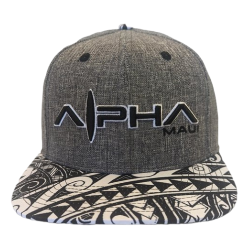 The "Night Garden" baseball cap features the words "Alpha Maui" in bold, stylized letters on the front. The visor displays a black and white intricate tribal pattern, providing a striking contrast to the cap's simple gray fabric design. Perfect Hawaii beach apparel, it embodies the true spirit of Ohana.