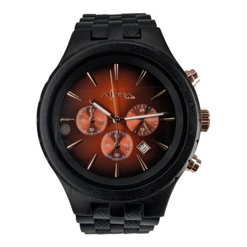 The Alpha Maui The Haleakalā is a black wristwatch that showcases a round face with a deep brown gradient background. It includes three subdials, silver hour markers, and a small date window between the 4 and 5 positions. The watch features a black textured strap, rose gold-tone accents, and pairs perfectly with your beach apparel for an Aloha vibe.