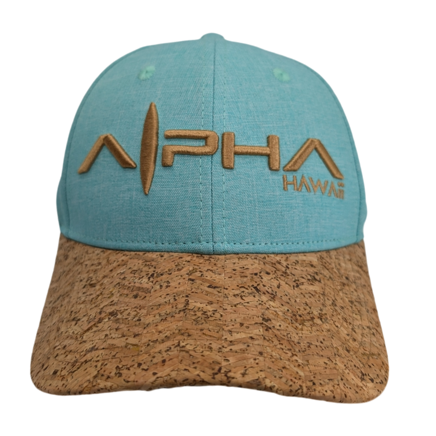 A turquoise baseball cap named "Turtle Cove II" with a beige cork brim. The front of the cap features the embroidered text "ALPHA HAWAII" in tan, with a surfboard design incorporated into the "A" of "ALPHA.